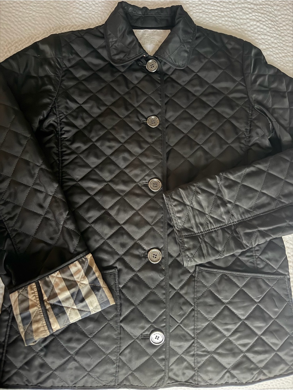 Burberry Black Quilted Jacket with Check Cuff Detail
